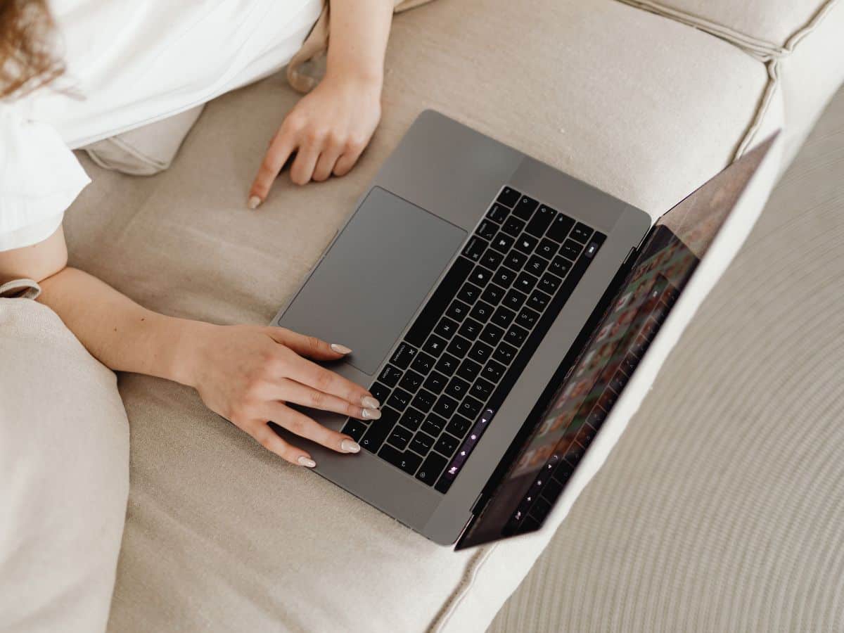 person using computer to research